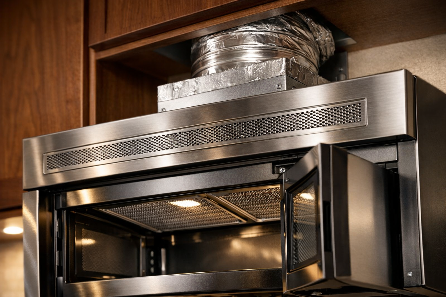 Over-the-range microwave vent and ducting alignment close-up