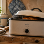 Rival roaster oven on kitchen counter with steam rising
