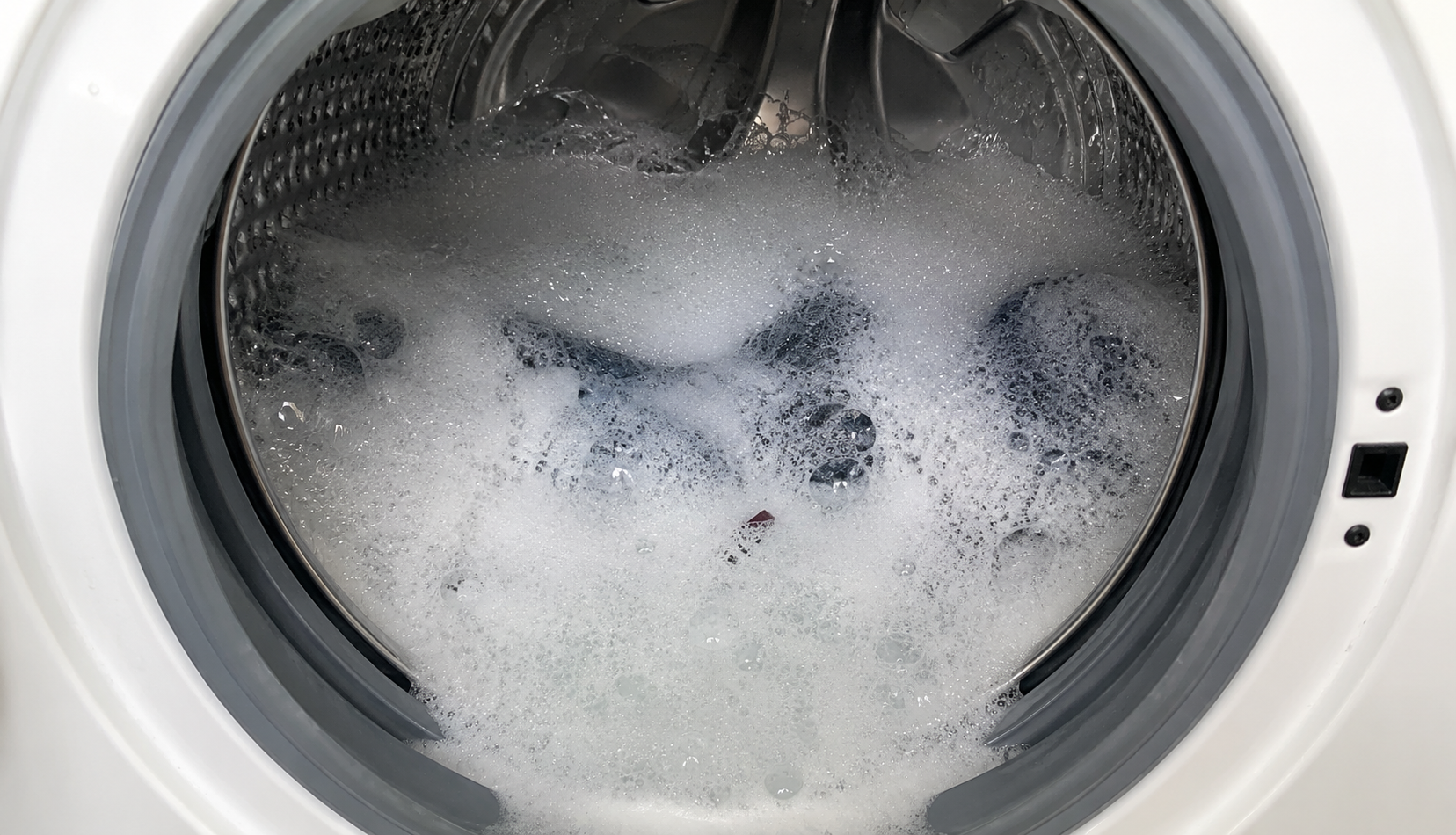 ChatGPT Image Jun 24, 2026, 03_25_41 AM sudsy cloudy water inside washing machine stuck on rinse