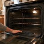 Open gas oven interior with no heat showing during troubleshooting diagnosis