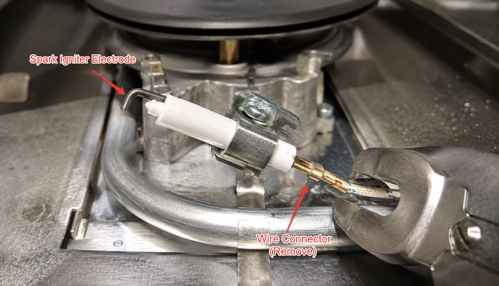 ChatGPT Image Jul 11, 2026, 12_20_04 AM Spark igniter electrode location with wire connector for replacement