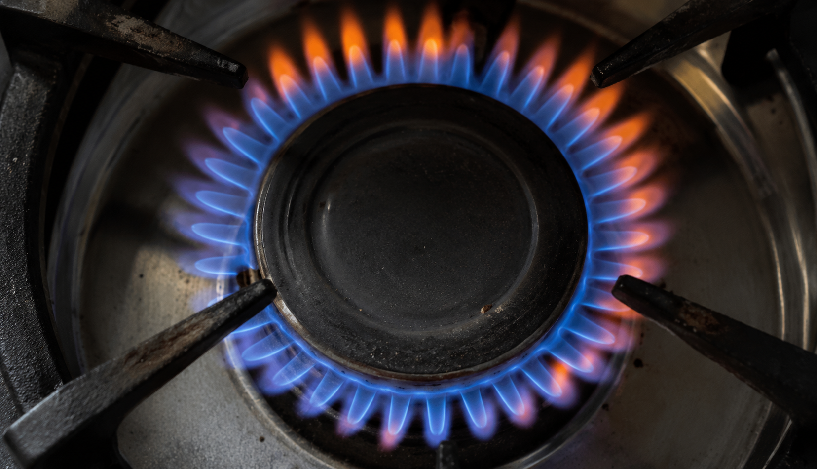 ChatGPT Image Jul 16, 2026, 11_57_45 PM Gas burner flame showing normal blue color with yellow tips