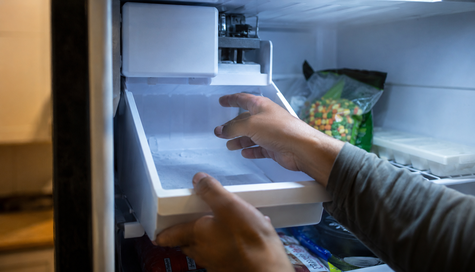 ChatGPT Image Jul 30, 2026, 04_26_32 PM Fresh ice dispensing into a glass from a repaired ice maker