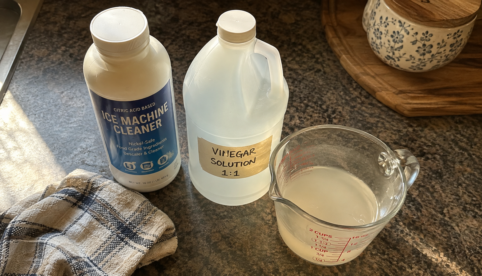 ChatGPT Image Aug 15, 2026, 03_23_36 PM Ice maker cleaner bottle and vinegar solution compared on counter