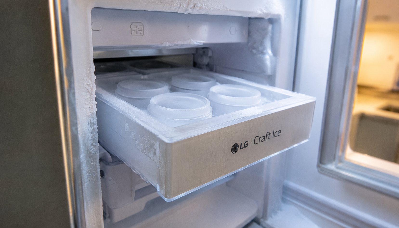 ChatGPT Image Aug 7, 2026, 11_27_42 PM LG Craft Ice tray removed from freezer compartment