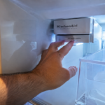Checking KitchenAid ice maker sensor inside freezer