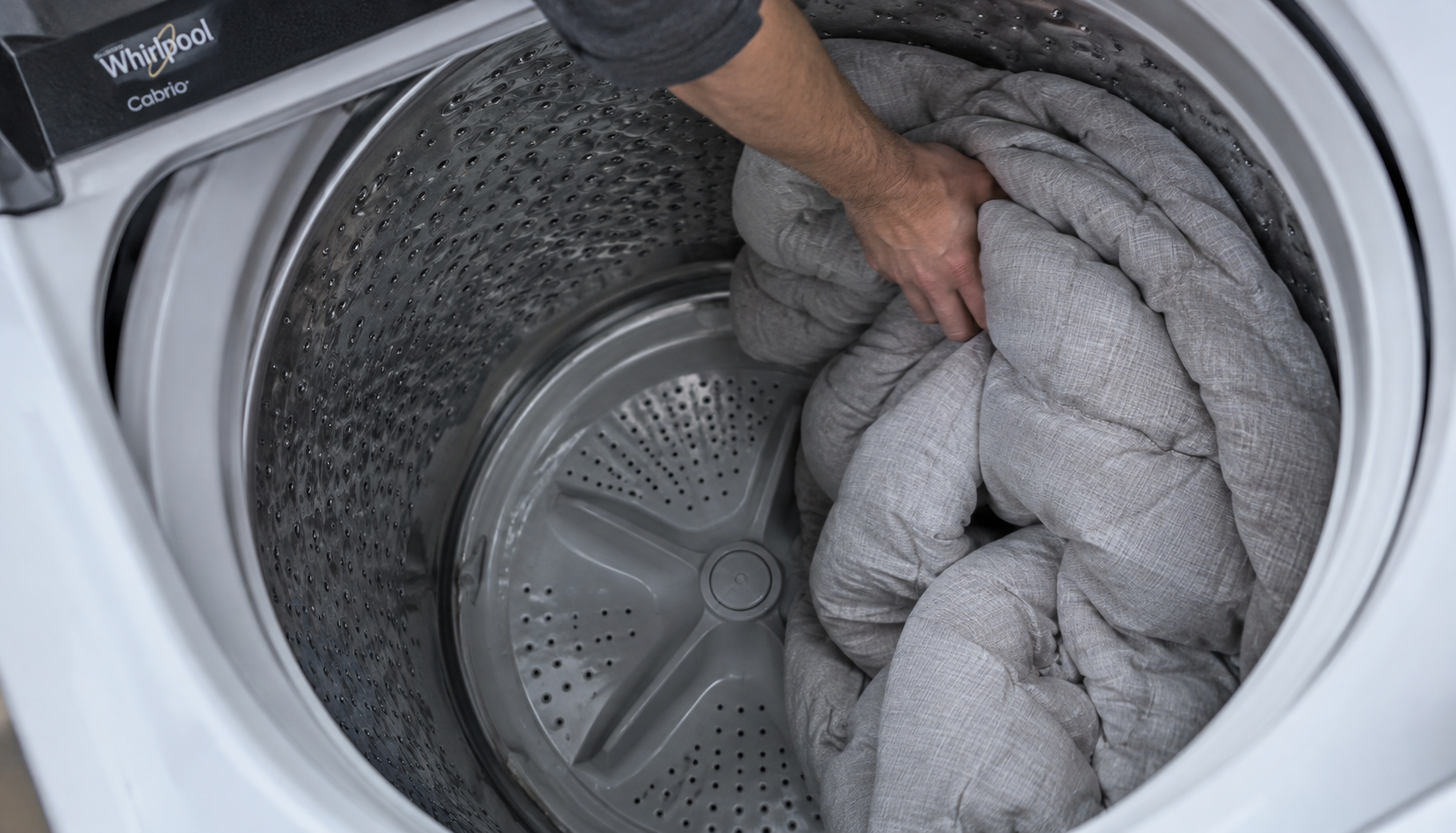 Loading a Comforter in the Washer Redistributing an unbalanced load inside a Whirlpool Cabrio washer